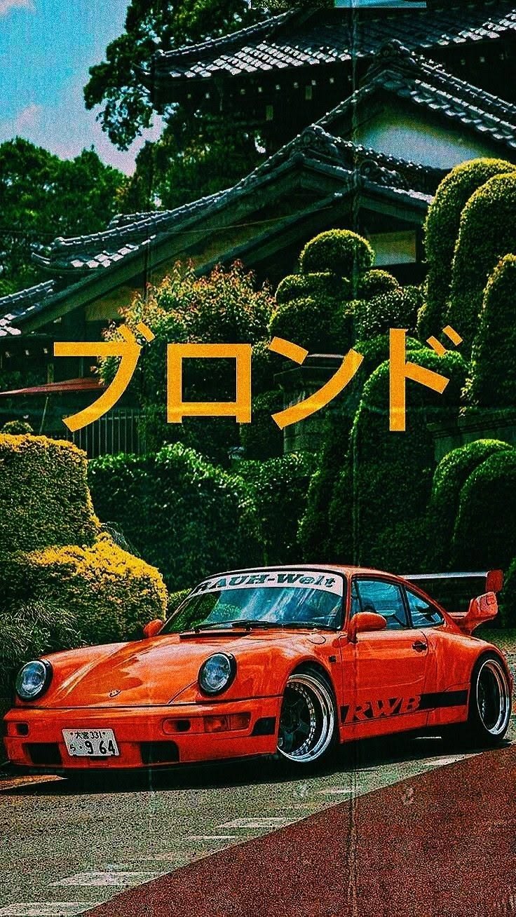 Porsche car poster on wall